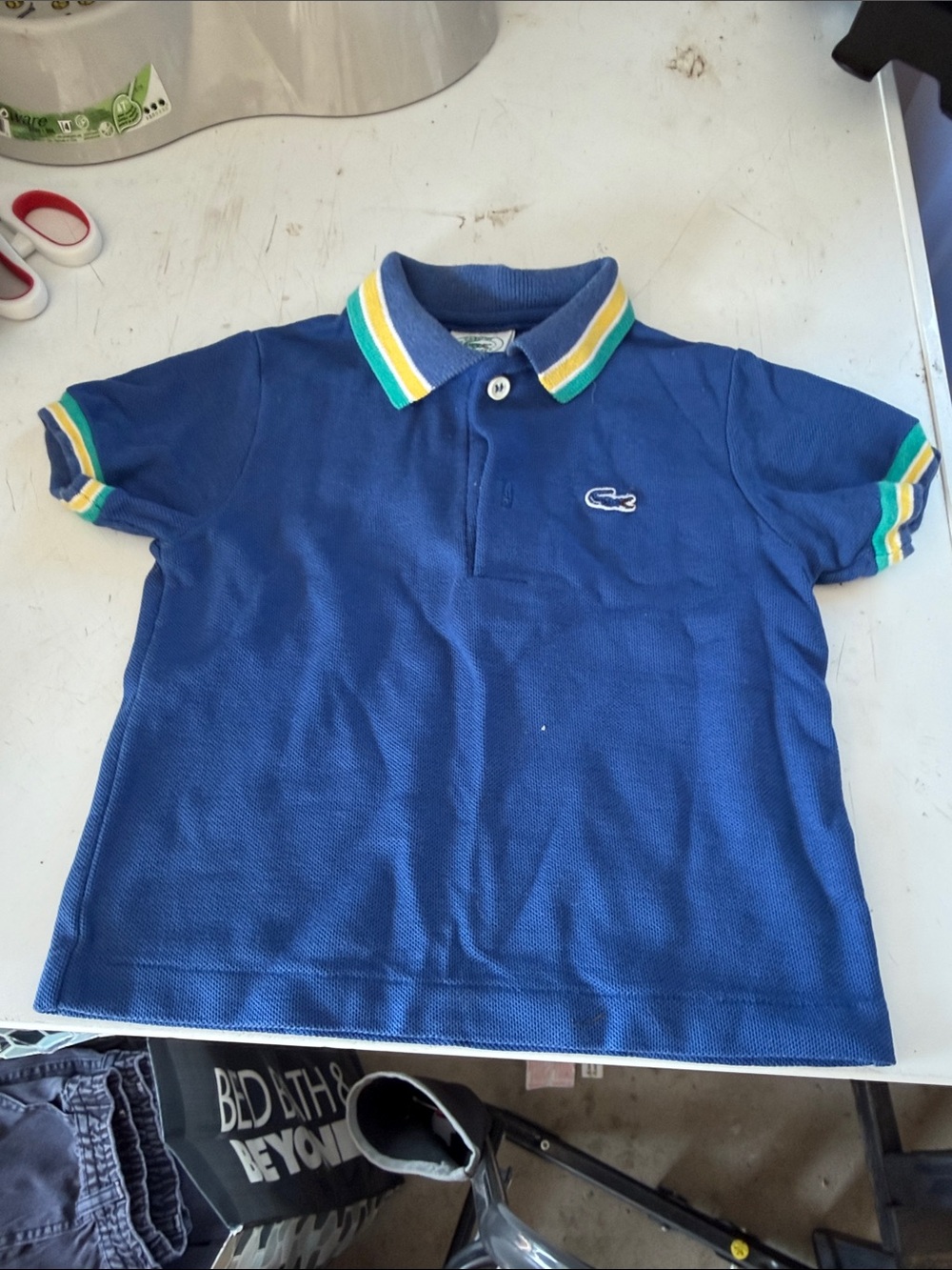 Lacoste Blue Kids Polo with Yellow & Green Stripe Trim